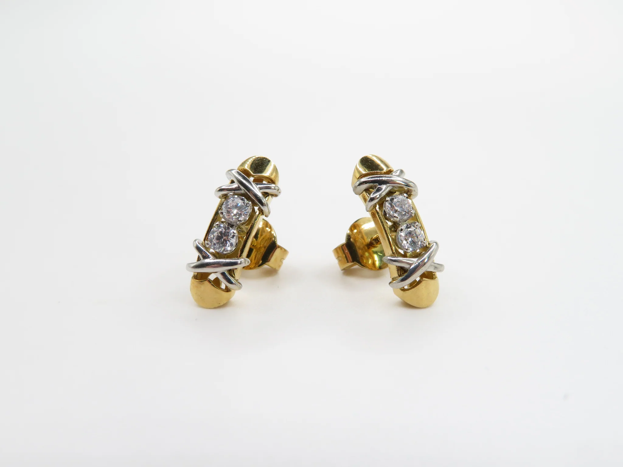19.25k Two Tone Crossover Earrings