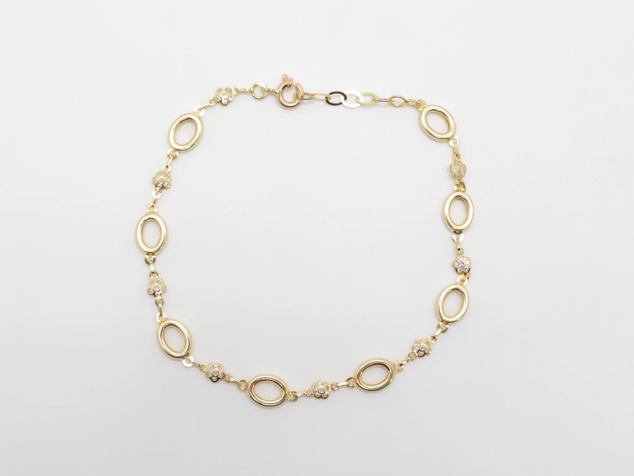 19.25k Yellow Gold Oval & Daisy Link CZ Bracelet