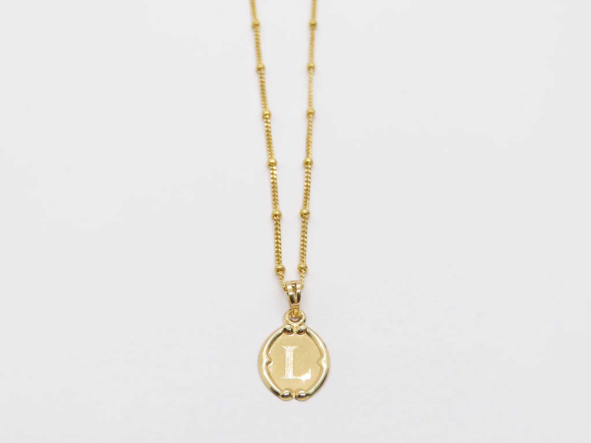 19.25k Oval Trimmed Initial Pendant - Image 29
