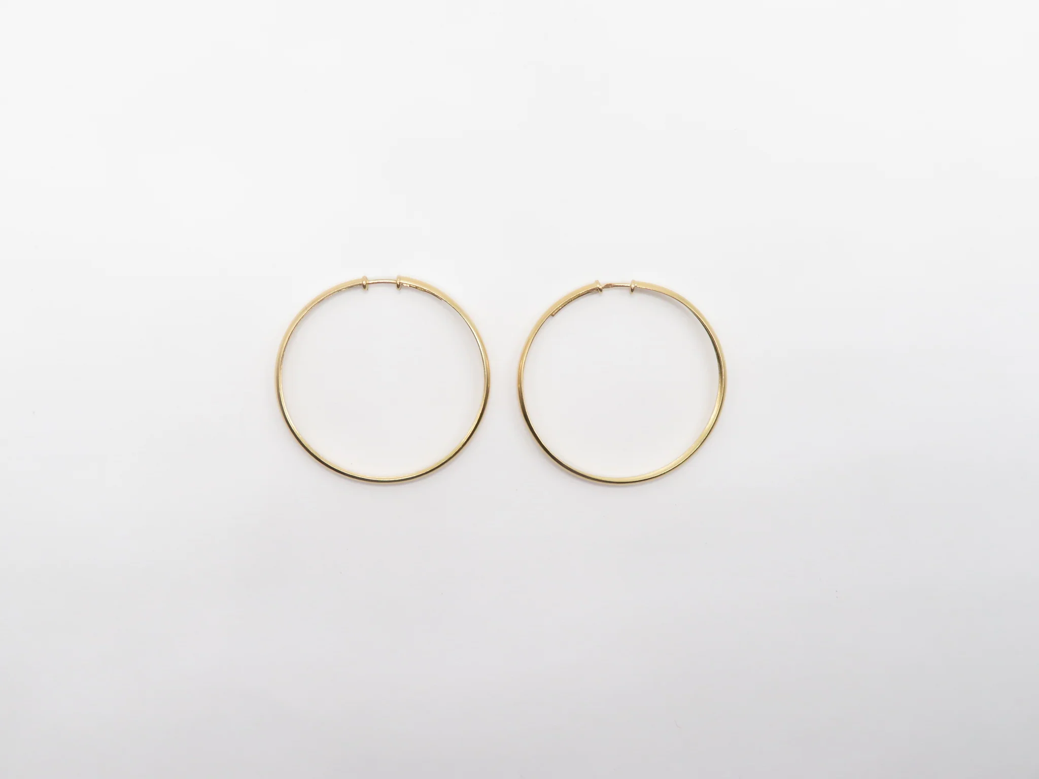 19.25k Yellow Gold Thin Domed Sleeper Hoops - Image 3